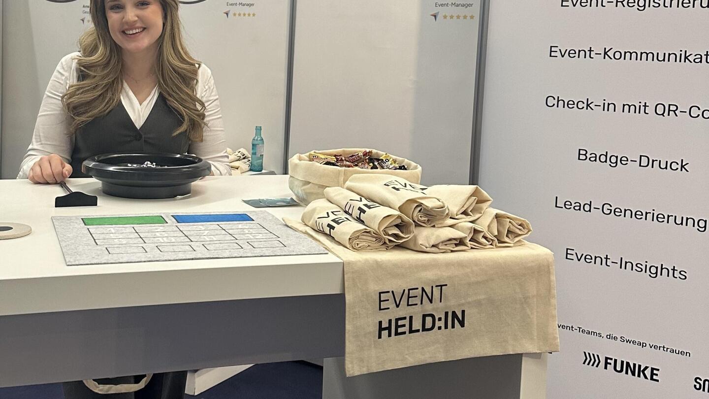 Sweap’s stand at BOE, spotlighting the Event Hero bags